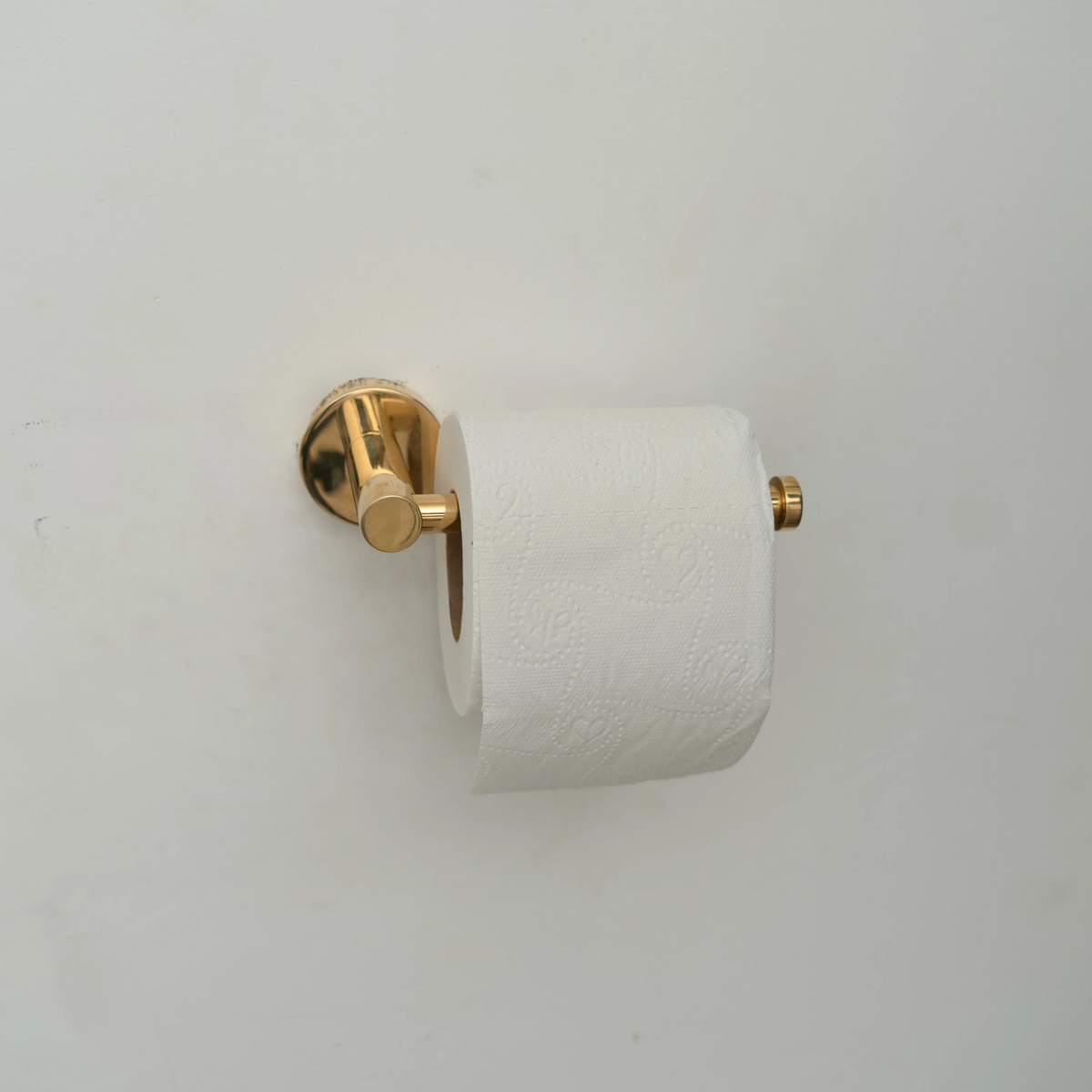 Unlacquered Brass Toilet Paper Holder – Open Roller Bar – detail of handle and finish