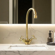 Gooseneck Unlacquered Brass Basin Faucet – Cross Handles