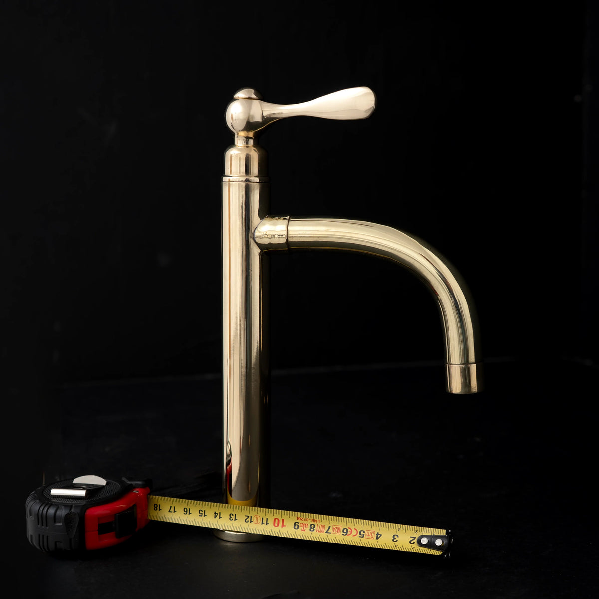 Unlacquered Brass Vessel Sink Faucet – Tall Single-Hole Spout – detail of handle and finish