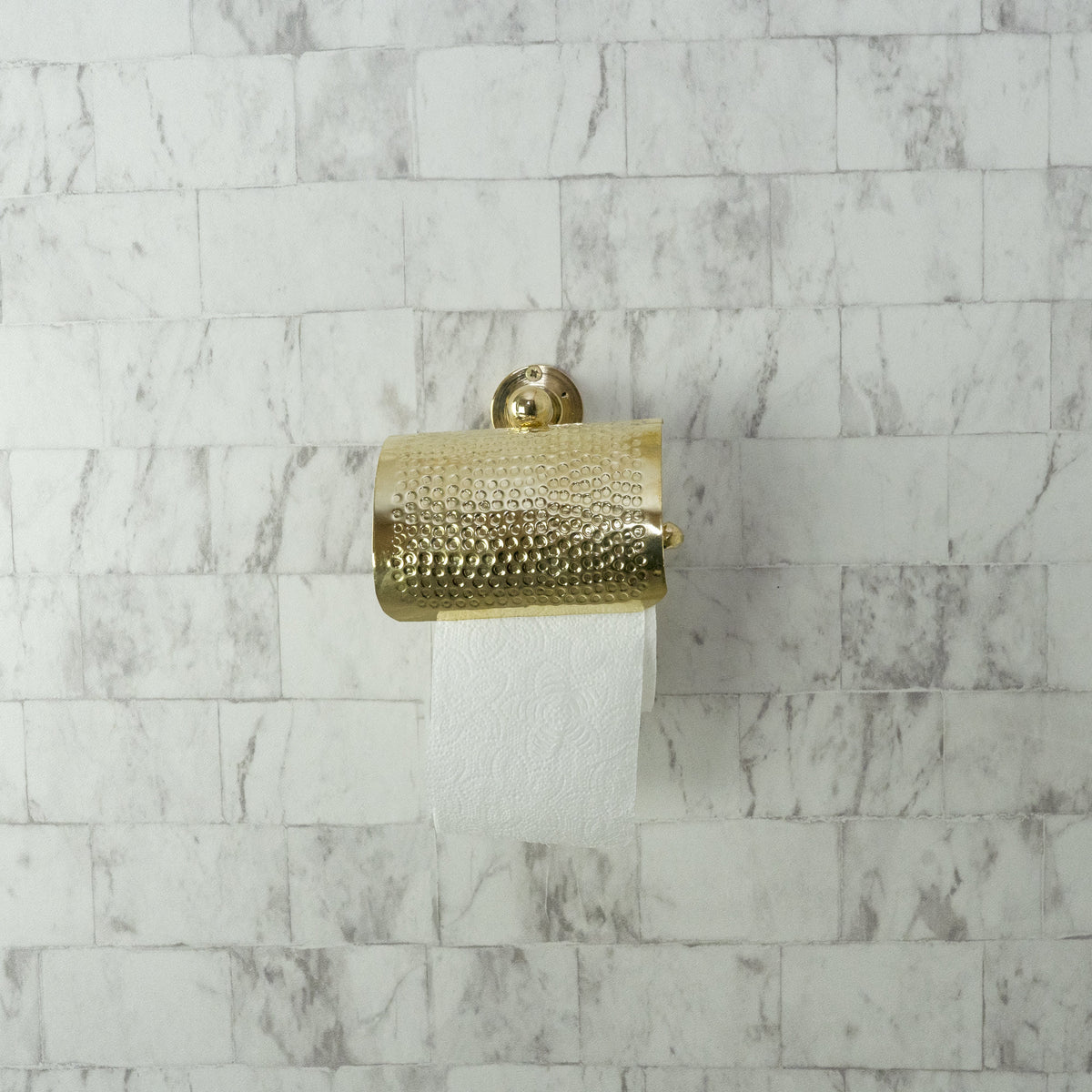 Unlacquered Brass Wall-Mounted Toilet Paper Holder – detail of handle and finish
