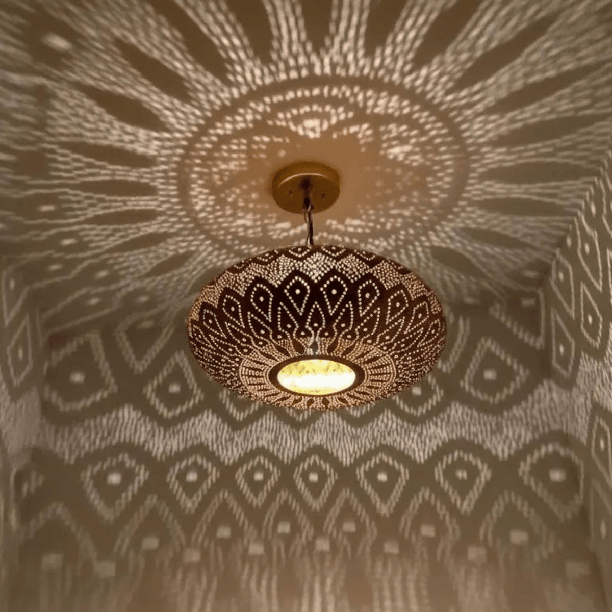 Brass Flush Pendant Light - Hand-Pierced Lotus Shadow Fixture – detail of hand-hammered patina finish