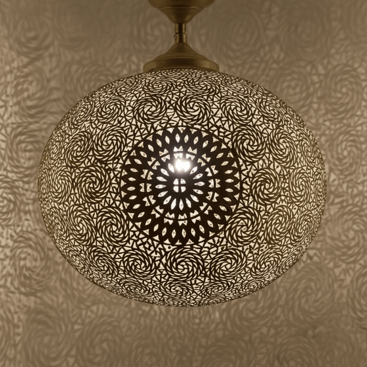 Brass Pendant Light - Boho Hanging Lamp with Shadow Patterns – detail of hand-hammered patina finish