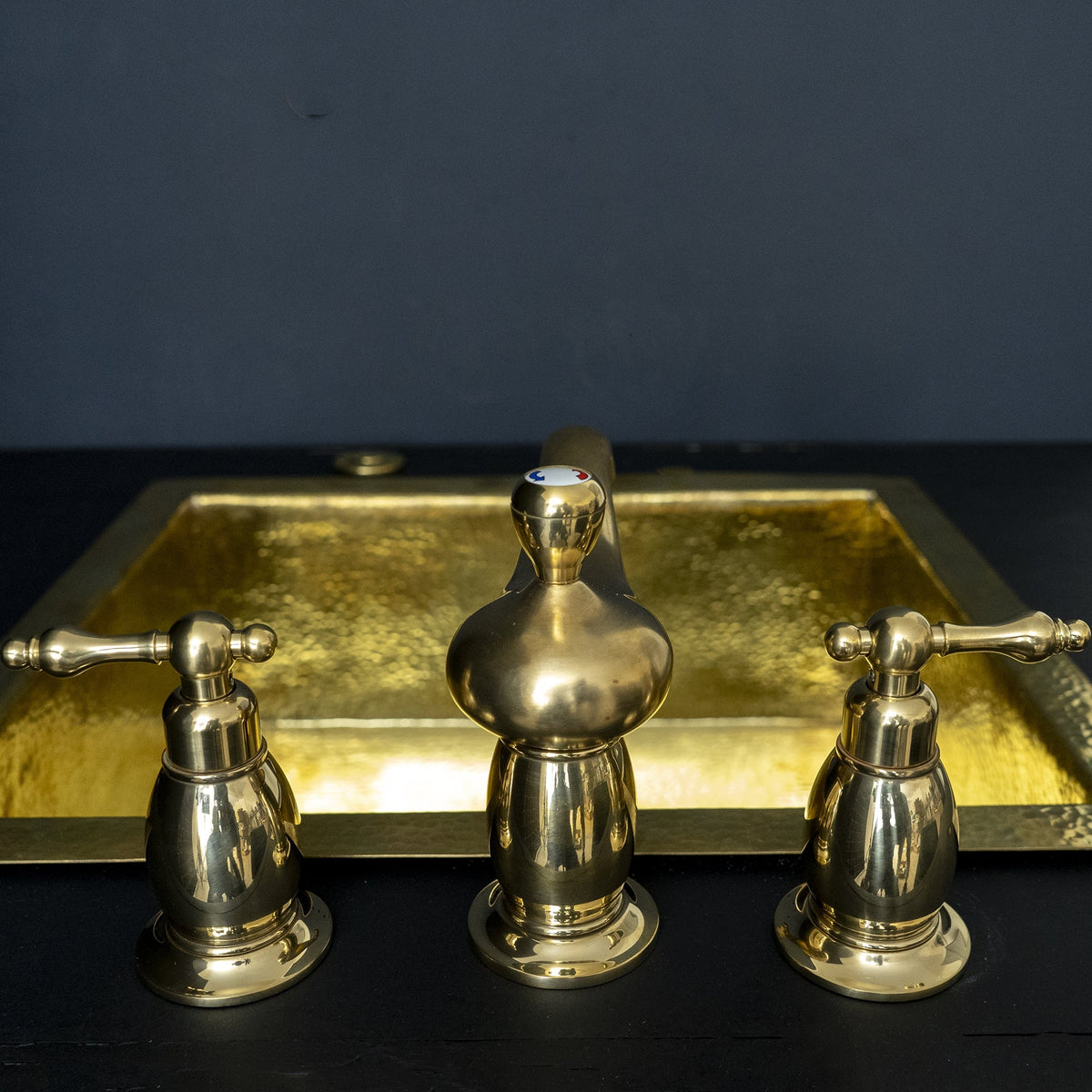 Unlacquered Brass Deck-Mounted Bathroom Faucet - 3-Hole Widespread - close-up detail