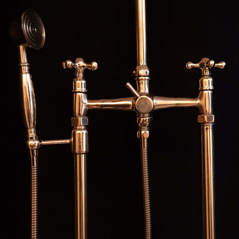 Unlacquered Brass Floor-Mounted Tub Filler with Handheld Shower – side profile