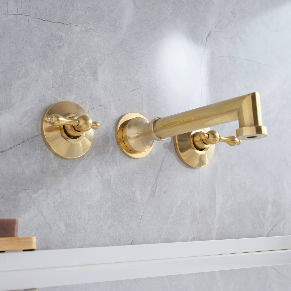 Avila Wall-Mount Bathroom Faucet – Lever Handles - installed above a bathroom vanity