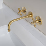 Wichita Unlacquered Brass Wall-Mount Bathroom Faucet – Cross Handles