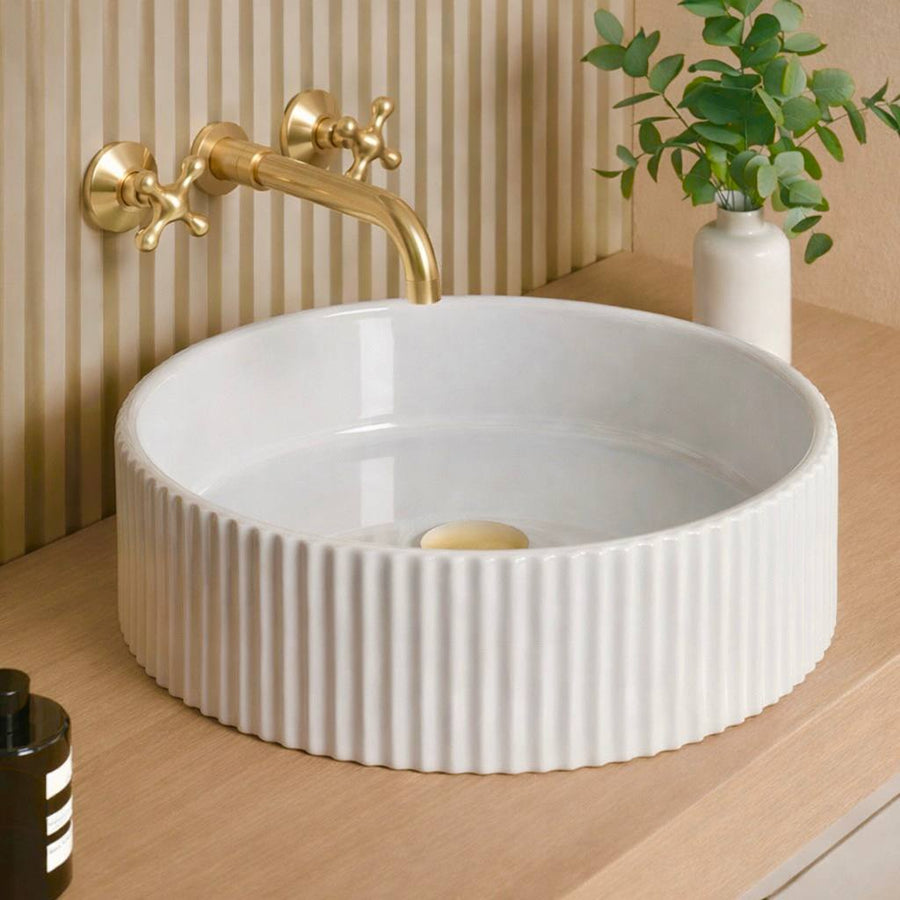 Clayton Unlacquered Brass Wall-Mount Bathroom Faucet – Cross Handles