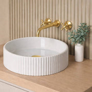 Clayton Unlacquered Brass Wall-Mount Bathroom Faucet – Cross Handles