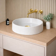 Clayton Unlacquered Brass Wall-Mount Bathroom Faucet – Cross Handles