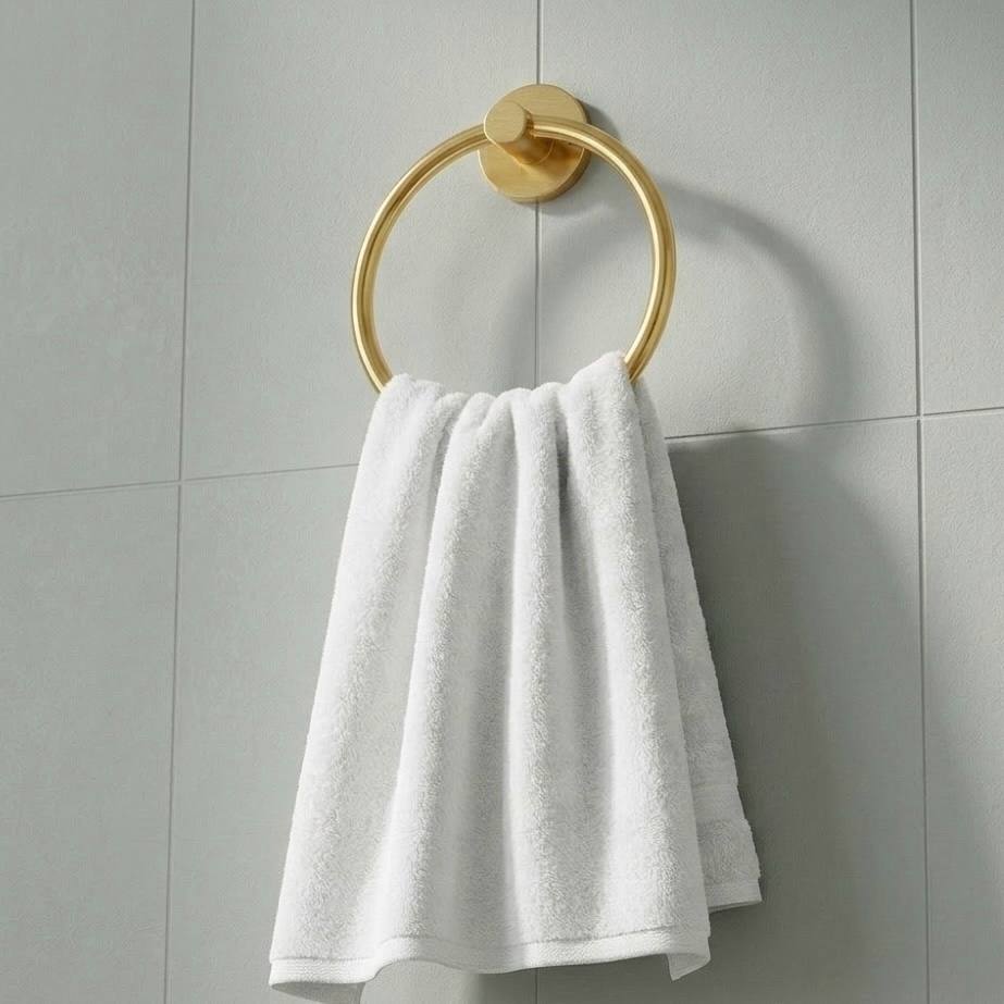 Unlacquered Brass Traditional Towel Ring - installed above a bathroom vanity