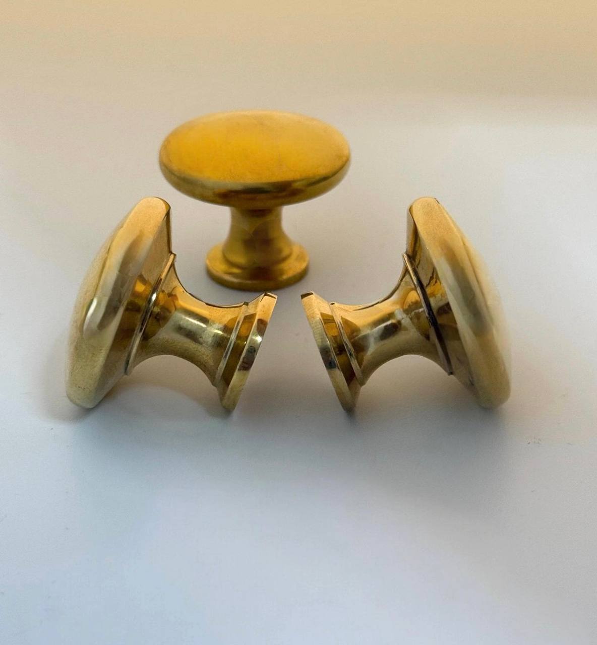 Unlacquered brass kitchen cabinet knob – angled view