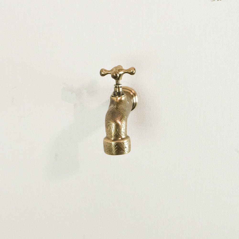 Engraved Unlacquered Brass Wall-Mounted Faucet - detail view
