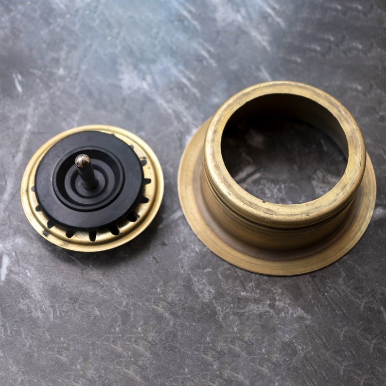 Unlacquered Brass Disposer Flange - Removable Basket Strainer - close-up detail