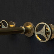 Unlacquered Brass Wall-Mounted Faucet – Round Handles